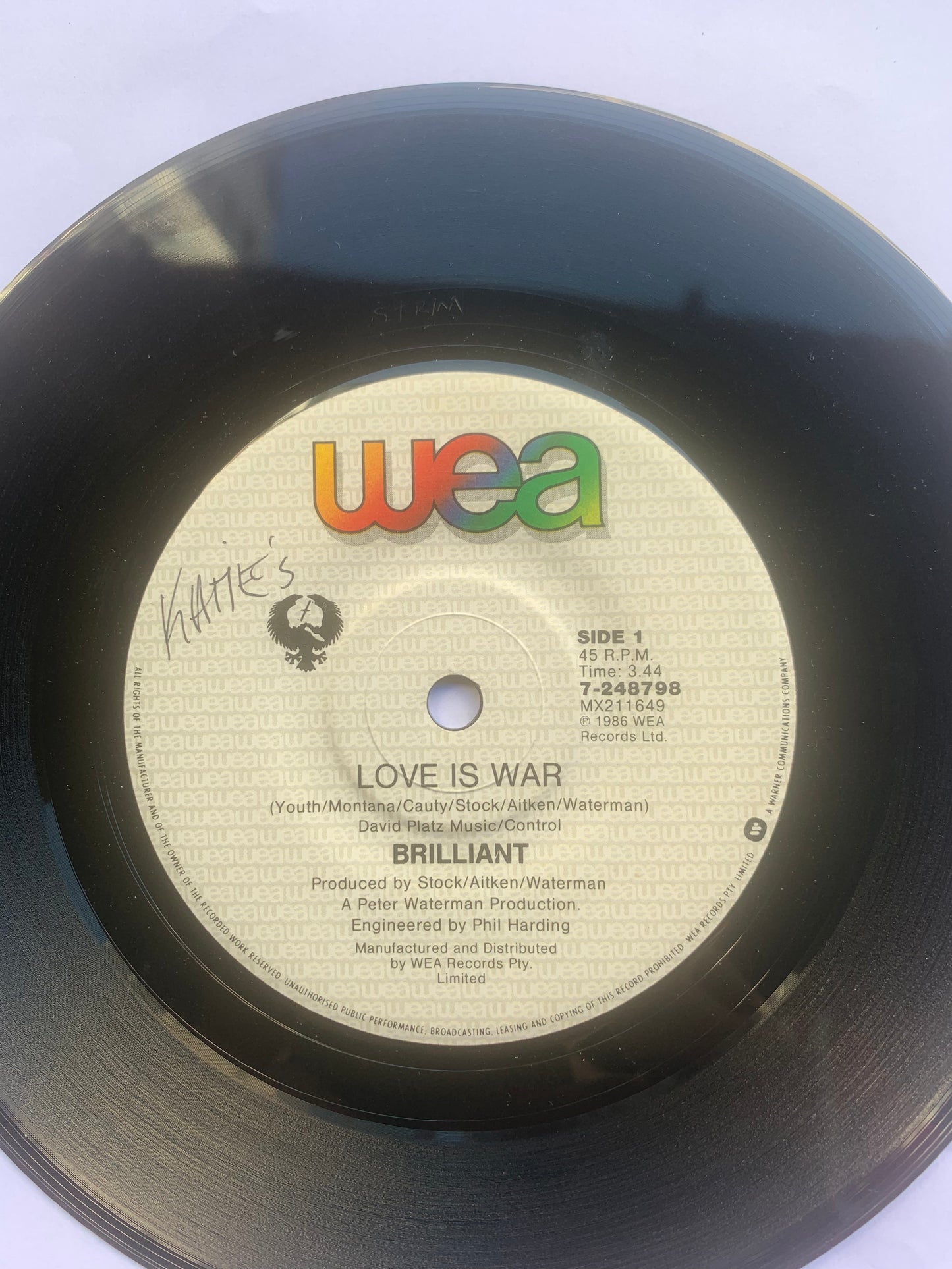 Record Single Brilliant Love is War 1986