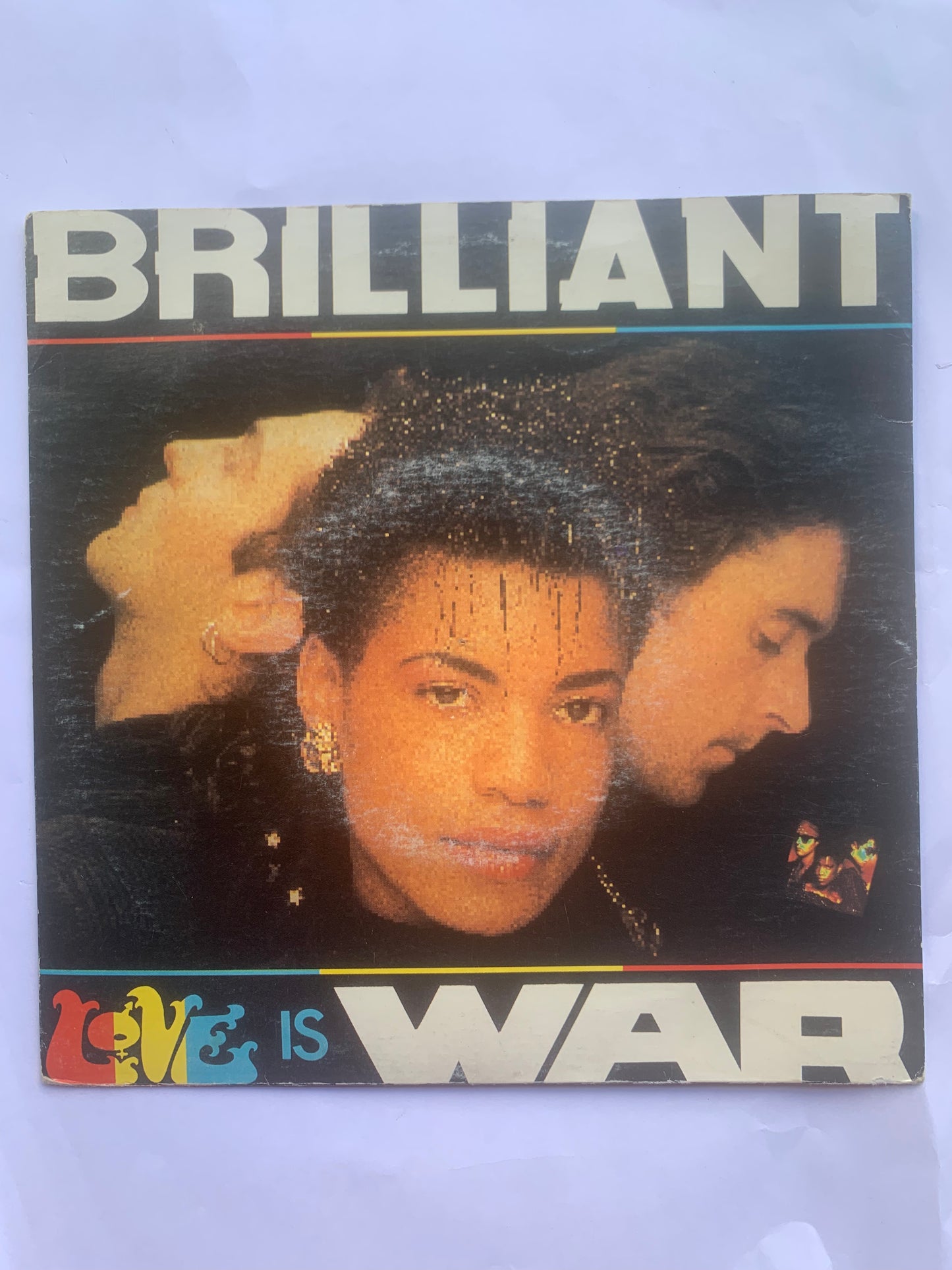 Record Single Brilliant Love is War 1986